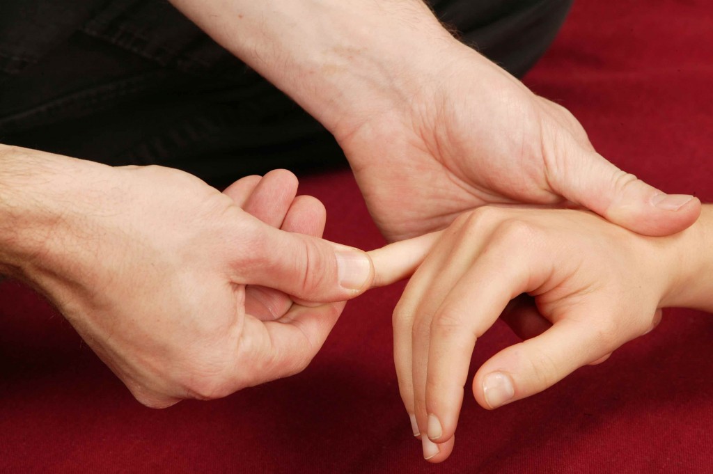 shiatsu avec traction de l'auriculaire